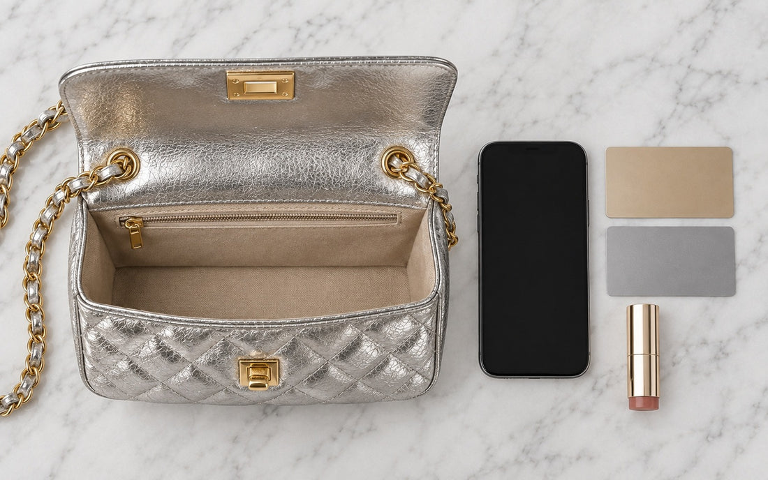 Inside view of the Misariva Cremona bag, with phone, card, and lipstick